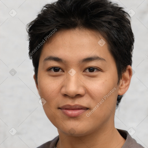 Joyful asian young-adult female with short  brown hair and brown eyes