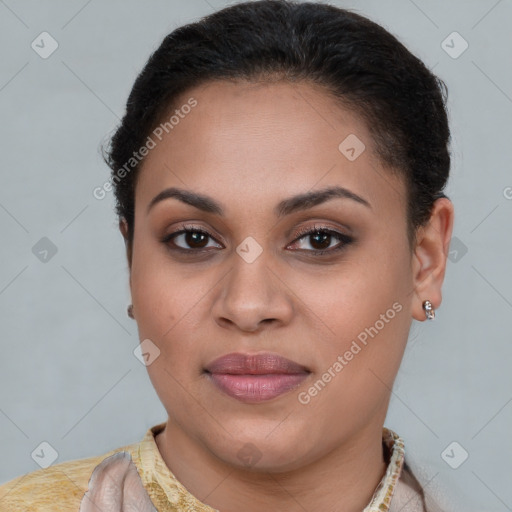 Joyful latino young-adult female with short  brown hair and brown eyes