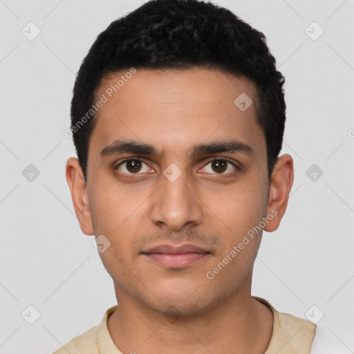 Neutral latino young-adult male with short  black hair and brown eyes