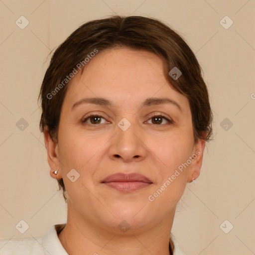 Joyful white adult female with short  brown hair and brown eyes