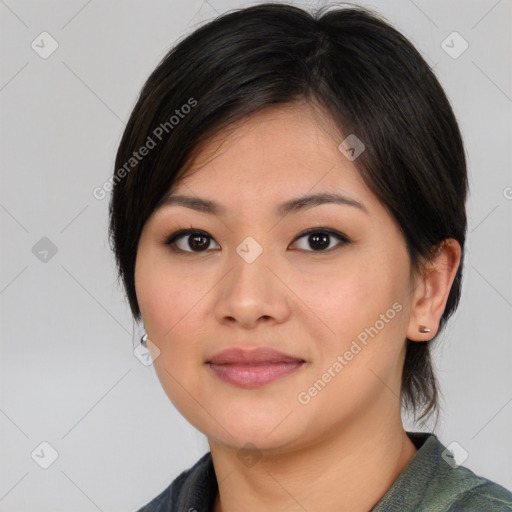 Joyful asian young-adult female with medium  brown hair and brown eyes