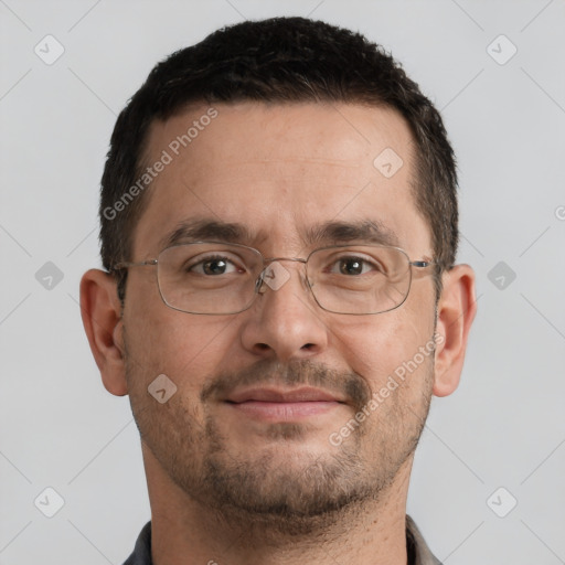 Joyful white adult male with short  brown hair and brown eyes