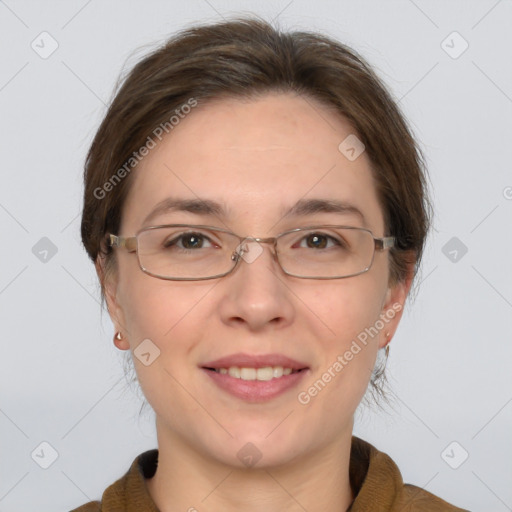 Joyful white adult female with medium  brown hair and grey eyes