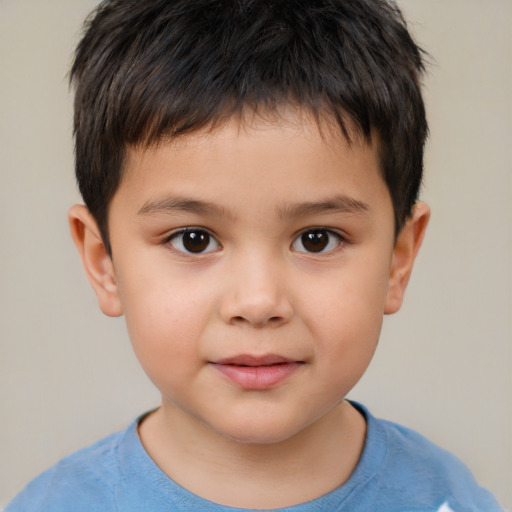 Joyful white child male with short  brown hair and brown eyes