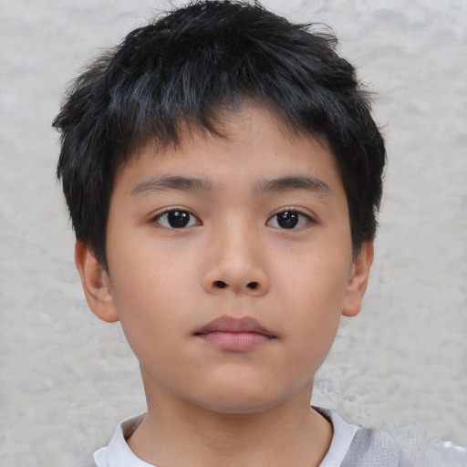 Neutral asian child male with short  brown hair and brown eyes