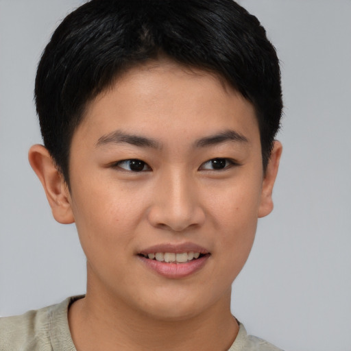 Joyful asian young-adult female with short  brown hair and brown eyes