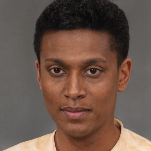Neutral black young-adult male with short  brown hair and brown eyes
