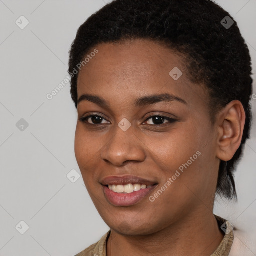 Joyful latino young-adult female with short  black hair and brown eyes