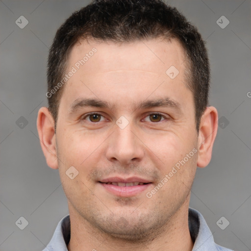 Joyful white young-adult male with short  brown hair and brown eyes