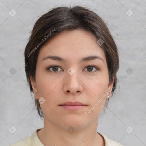 Neutral white young-adult female with medium  brown hair and brown eyes