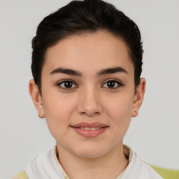 Joyful white young-adult female with short  brown hair and brown eyes