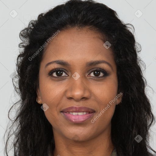 Joyful black young-adult female with long  brown hair and brown eyes