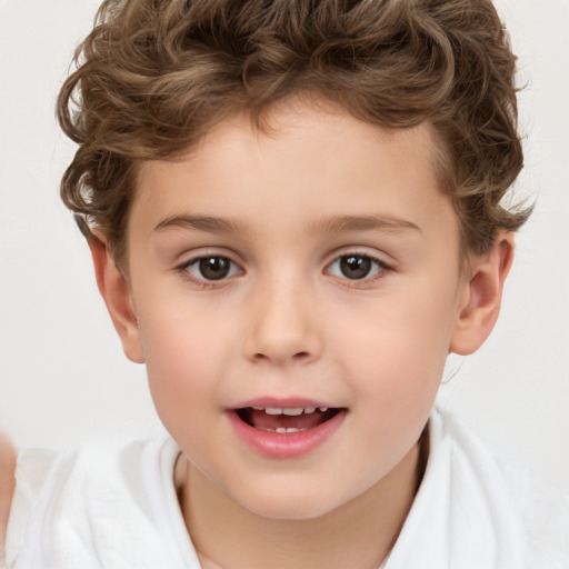 Joyful white child male with short  brown hair and brown eyes