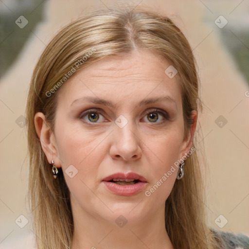 Joyful white adult female with long  brown hair and brown eyes