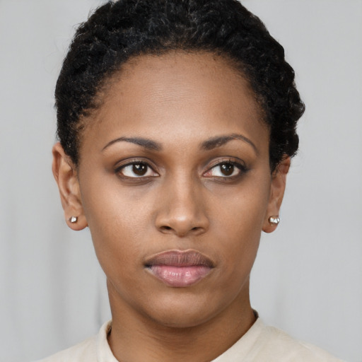 Neutral black young-adult female with short  black hair and brown eyes