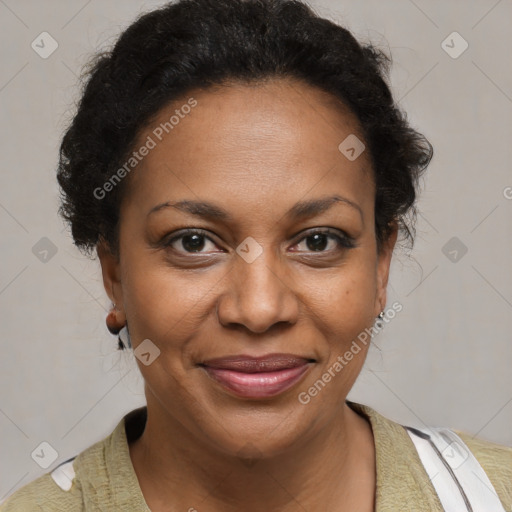 Joyful black adult female with short  brown hair and brown eyes