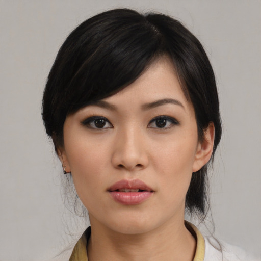 Neutral asian young-adult female with medium  black hair and brown eyes