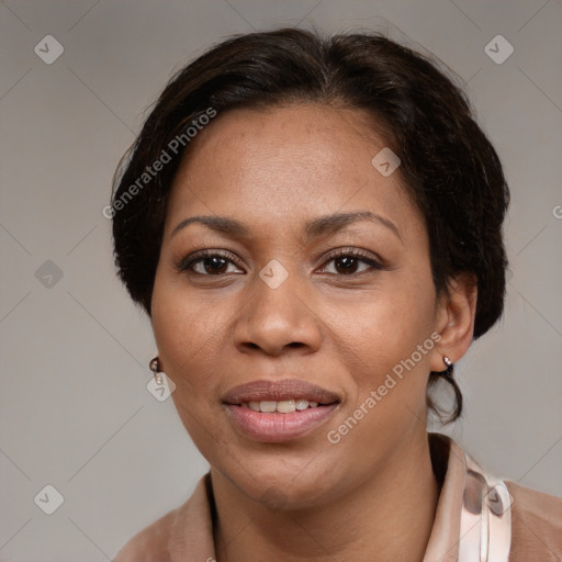 Joyful latino adult female with medium  brown hair and brown eyes