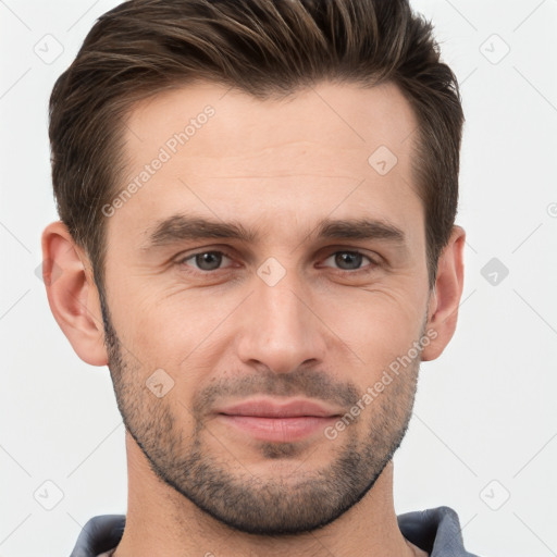 Joyful white young-adult male with short  brown hair and brown eyes