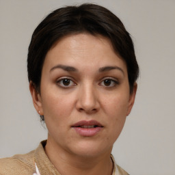 Neutral white young-adult female with short  brown hair and brown eyes