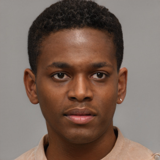 Neutral black young-adult male with short  brown hair and brown eyes
