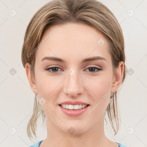 Joyful white young-adult female with medium  brown hair and blue eyes