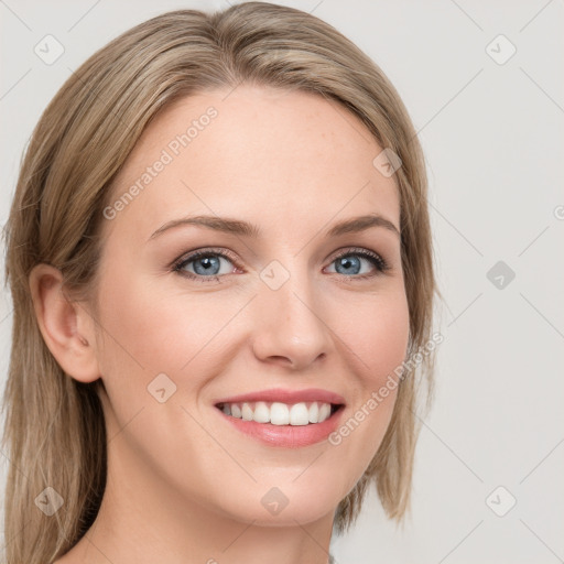 Joyful white young-adult female with medium  brown hair and blue eyes