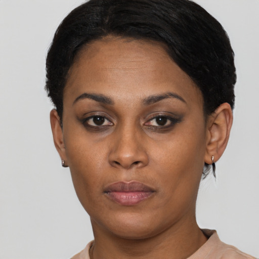 Neutral latino young-adult female with short  brown hair and brown eyes