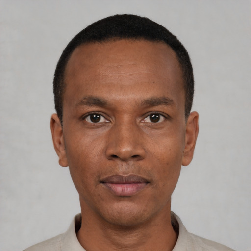 Neutral black young-adult male with short  black hair and brown eyes