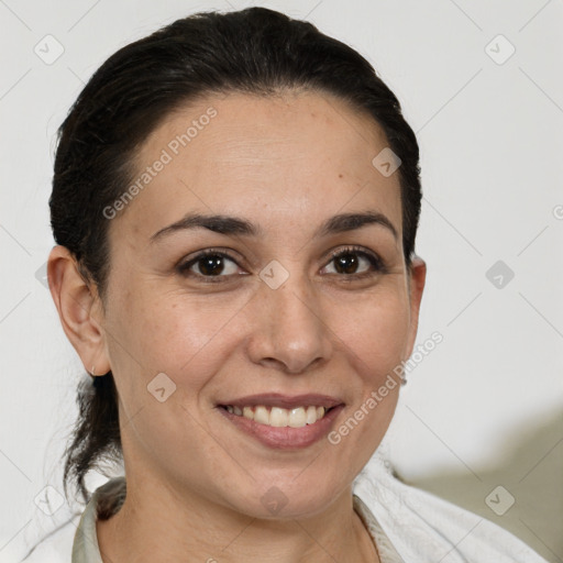 Joyful white adult female with short  brown hair and brown eyes