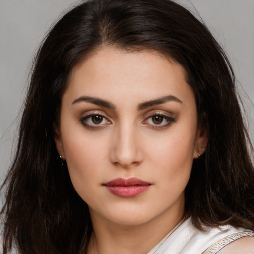 Neutral white young-adult female with long  brown hair and brown eyes