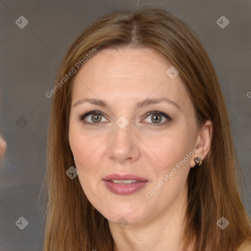 Joyful white adult female with long  brown hair and brown eyes