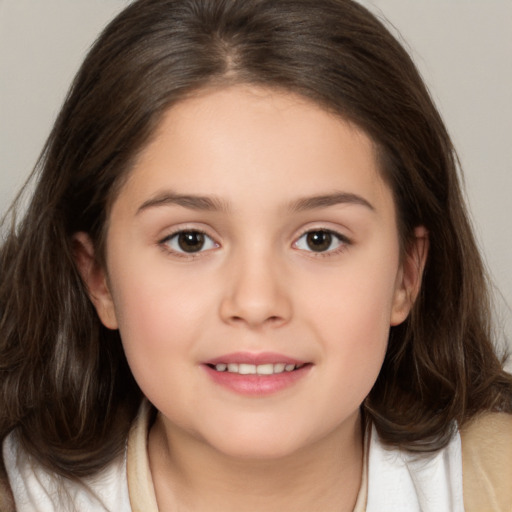 Joyful white child female with medium  brown hair and brown eyes