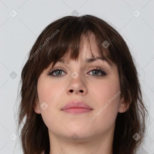 Neutral white young-adult female with long  brown hair and brown eyes