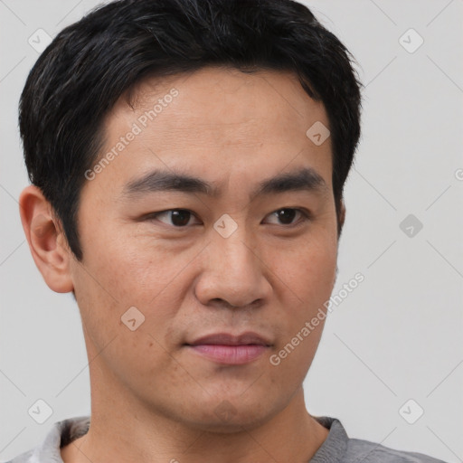 Neutral asian young-adult male with short  brown hair and brown eyes