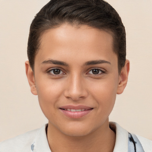 Joyful white young-adult female with short  brown hair and brown eyes