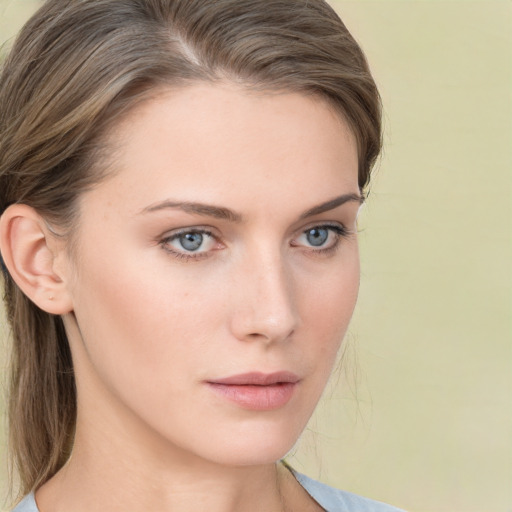 Neutral white young-adult female with medium  brown hair and grey eyes