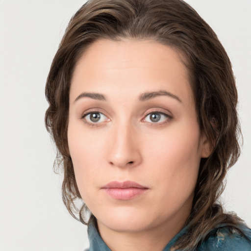 Neutral white young-adult female with medium  brown hair and grey eyes