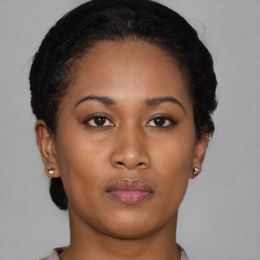 Neutral black young-adult female with short  black hair and brown eyes