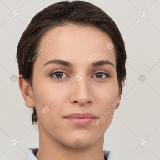 Neutral white young-adult female with short  brown hair and brown eyes