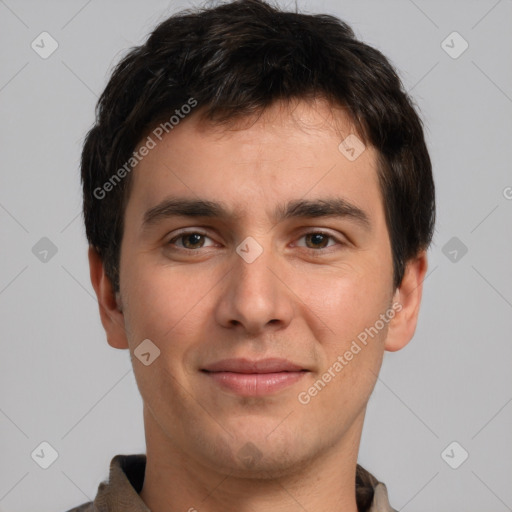 Joyful white young-adult male with short  brown hair and brown eyes