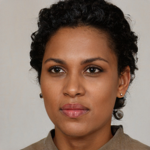 Neutral black young-adult female with short  black hair and brown eyes