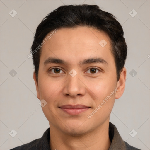 Joyful white young-adult male with short  black hair and brown eyes