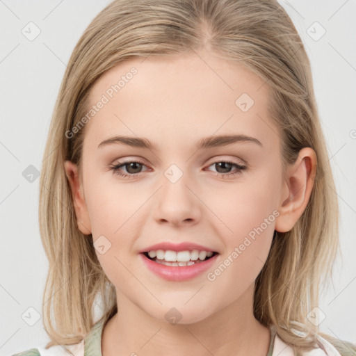 Joyful white child female with medium  brown hair and brown eyes