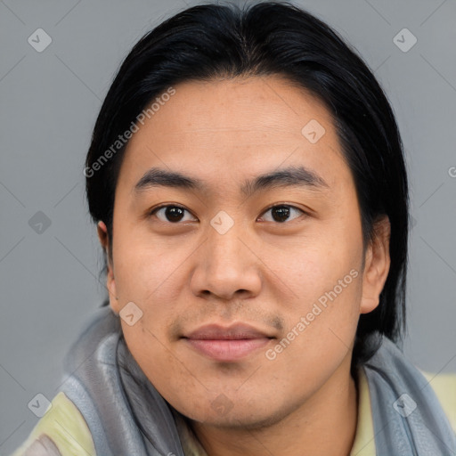 Joyful asian young-adult male with short  black hair and brown eyes