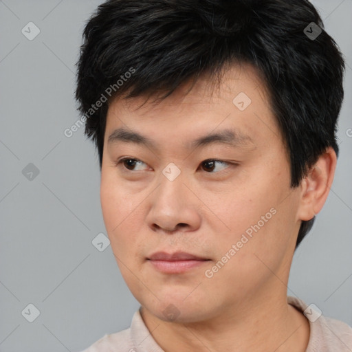 Neutral asian young-adult male with short  brown hair and brown eyes