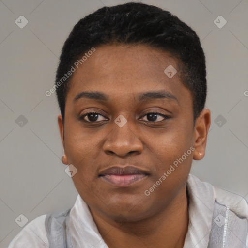 Joyful black young-adult female with short  black hair and brown eyes