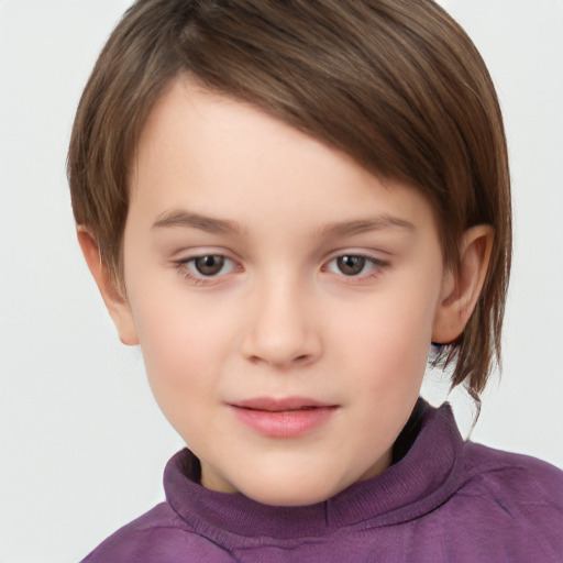 Joyful white child female with short  brown hair and brown eyes