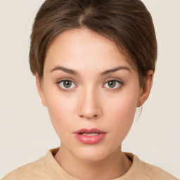 Neutral white young-adult female with short  brown hair and brown eyes