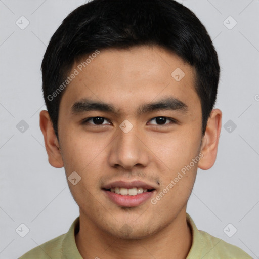 Joyful white young-adult male with short  black hair and brown eyes